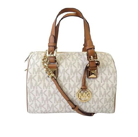 michael kors mini purse with metal plate with est 1967|Michael Kors small purse sale.